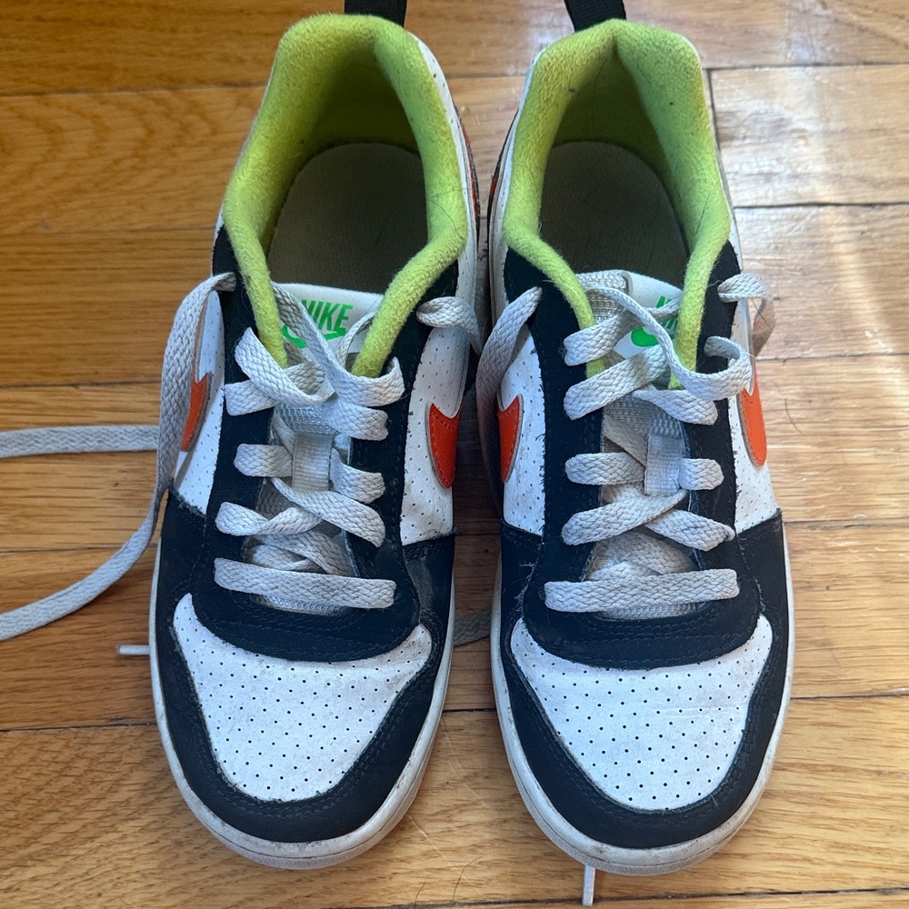 Nike Kids Black, White, and Orange Sneakers